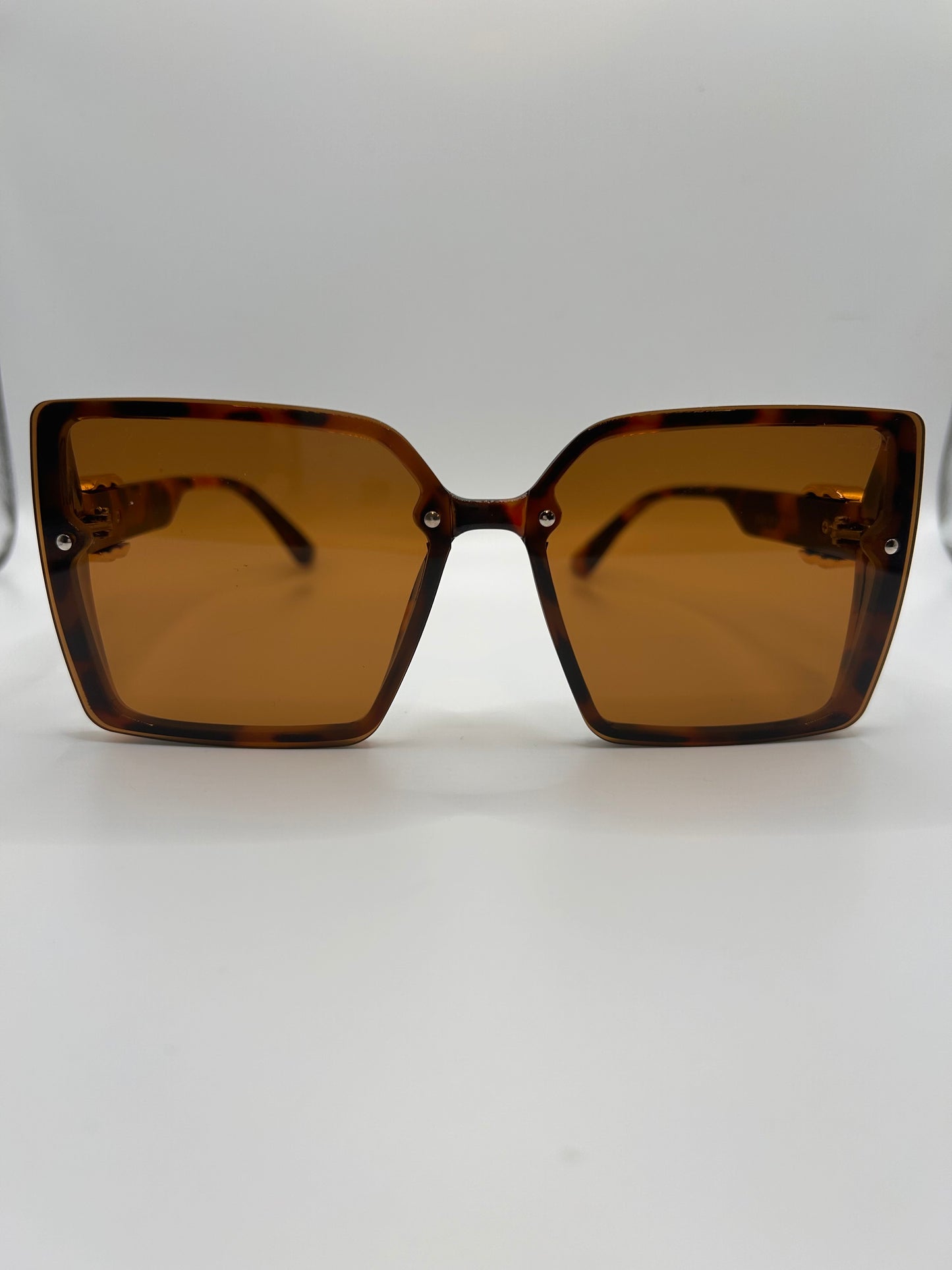 Puchi G Sunglasses with side of bling