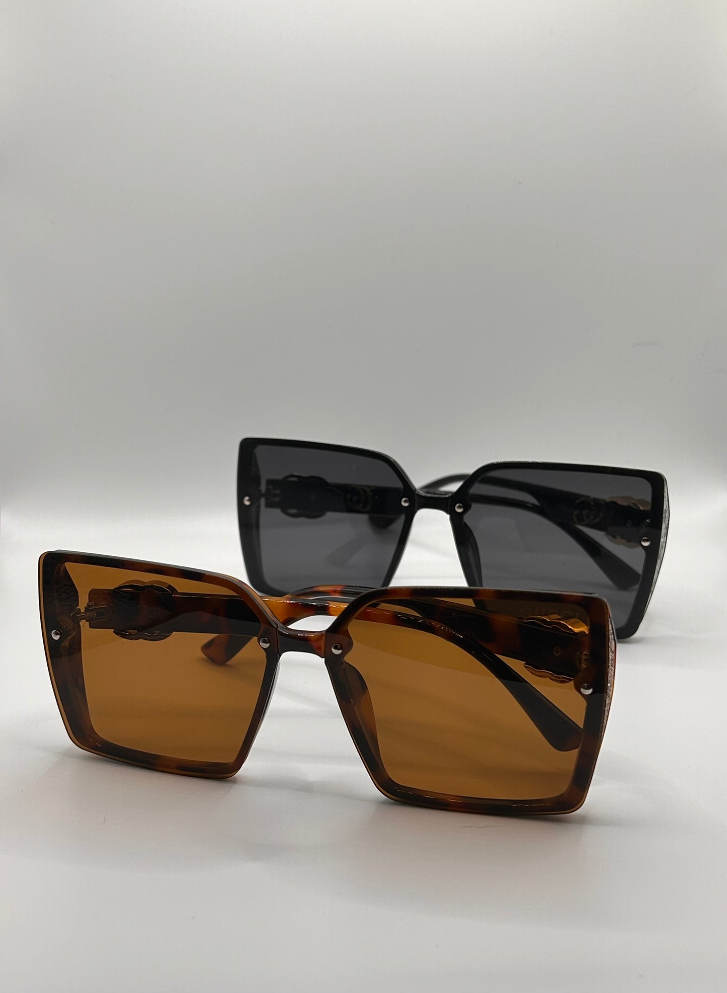 Puchi G Sunglasses with side of bling