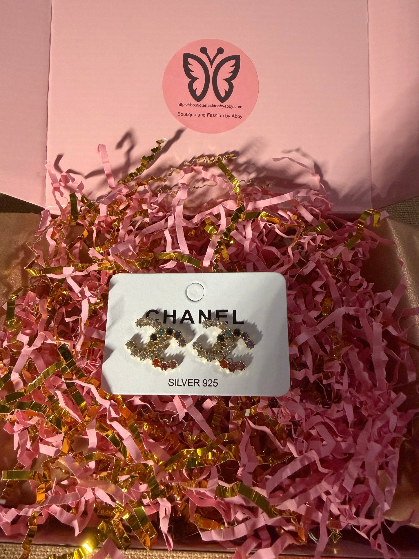 Coco Cc with rhinestone earrings